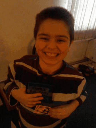 KidCash bills and a wallet in use
